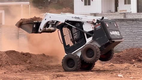 fastest skid steer|highest lifting skid steer.